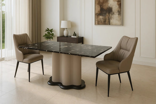 Luxury black marble dining table with ribbed sculptural base in modern interior