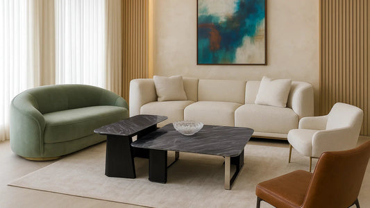 Modern living room with a beige sofa, green armchair, and abstract painting on the wall. 