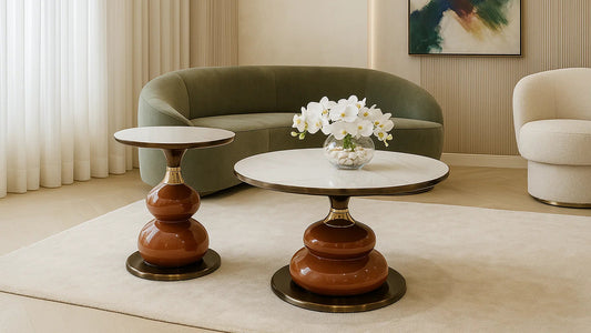 Modern living room with a green sofa, round coffee table, and abstract painting.