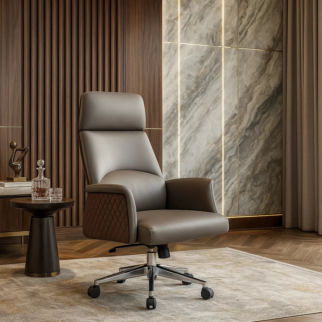 Gray office chair in a modern room with marble wall and wooden side table.